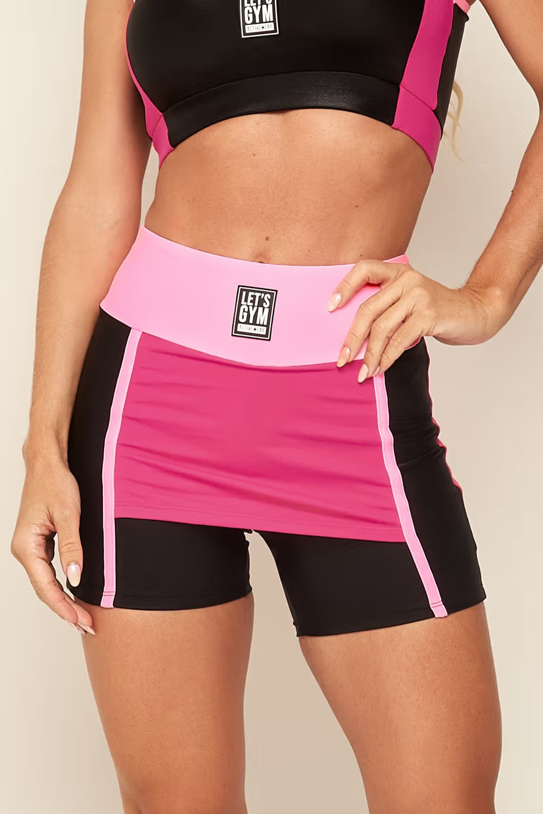 Conjunto Fitness Elláda Rosa Top + Shorts Saia